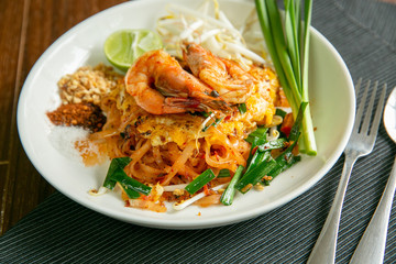 Pad Thai placed on a wooden table