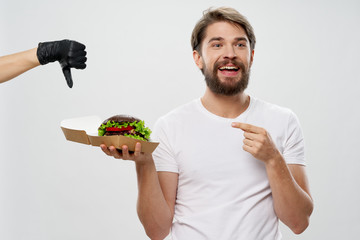 young man eating salad