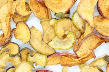 Beautiful dried apples located on a white background