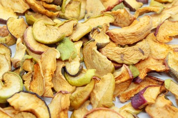 Beautiful dried apples located on a white background