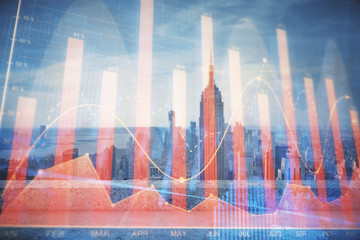 Forex graph on city view with skyscrapers background multi exposure. Financial analysis concept.