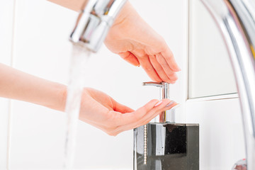 A man washes his hands. Hand hygiene closeup. Hand washing with soap. Precautions and prevention of coronavirus.