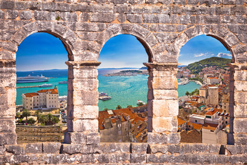 Split waterfront aerial panoramic view through stone window © xbrchx