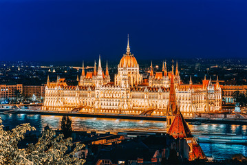 Fototapeta na wymiar Hungarian Parliament at evening. Budapest. One of the most beautiful buildings in the Hungarian capital.