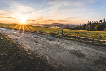 road in the countryside at sunset