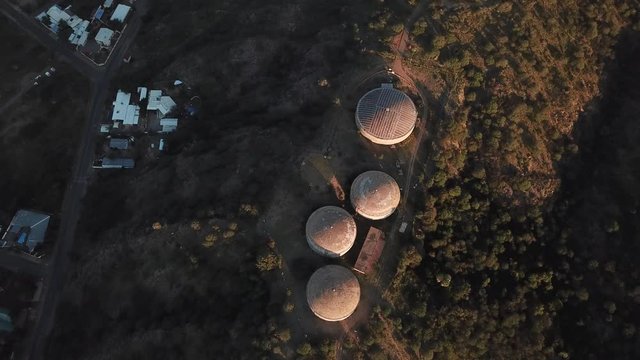 4K aerial drone video savanna hills, old historical water storage reservoirs in Klein Windhoek residential suburb in Namibia's capital in central highland Khomas Hochland of Namibia, southern Africa