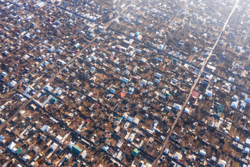 Kainar Bulak residential area in Shymkent aerial view. Dense development of private houses. Texture...