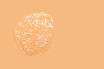 Alcohol hand sanitizer gel for hand hygiene corona virus (Covid-19) protection. Orange background