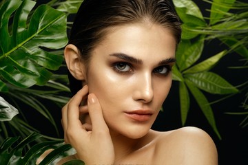Beautiful woman naked shoulders clean skin cosmetics