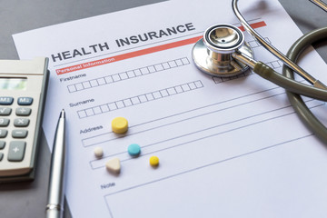 Health insurance form with model and policy document