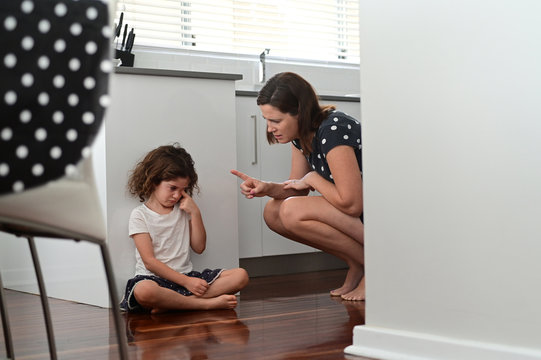 Mother Telling Off And Discipline Naughty Daughter