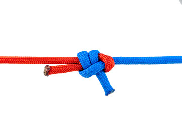 Knot on a cord isolated on a white background .