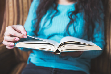 woman reading book