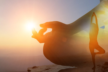 Double exposure of young women meditate while doing yoga meditation.