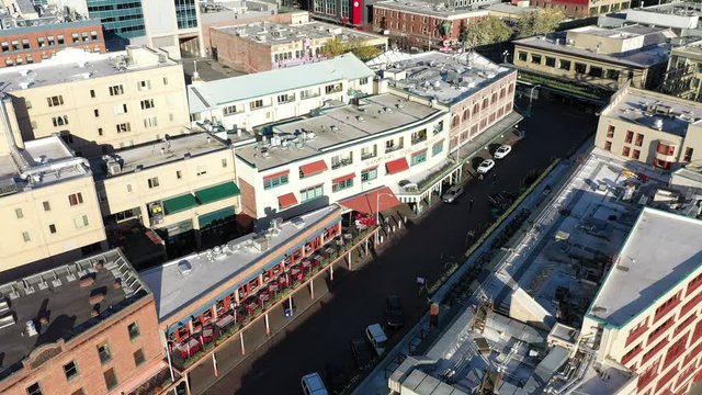 Aerial / Drone Footage Of Pike Place Market, Empty Streets, No Tourists, Waterfront Without People Downtown And In The Commercial, Business District Of Seattle, Washington