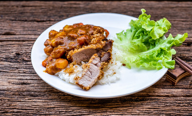 Rice with deep fried pork and curry in Japanese style. soft focus
