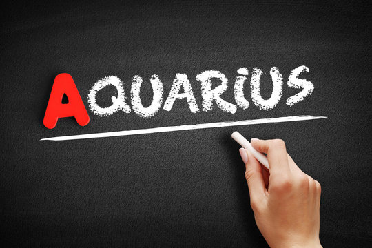 Aquarius text on blackboard, concept background