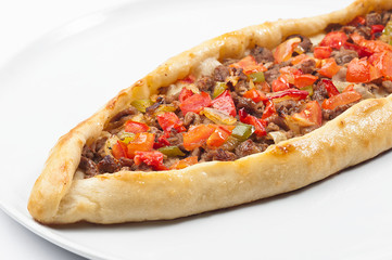Turkish pide pizza on a white background. Turkish traditional cuisine