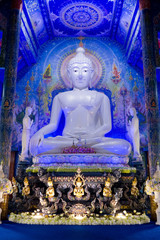 Obraz premium Famous Blue Temple in Chiang Rai Wat Rong Suea Ten in the North Thailand at the sunset time
