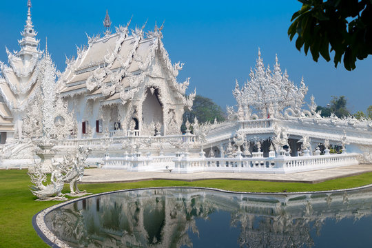 Unique white temple and popular tourist attraction in Chiang Rai (known as Wat Rong Khun) in the North of Thailand