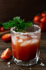 Tomato juice with ice in a glass