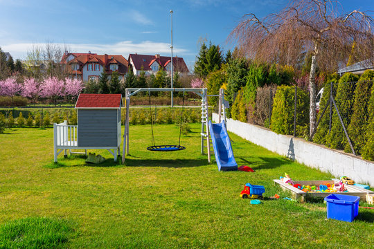 Garden playground with beautiful wooden house for children