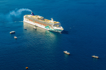 Luxury cruise ship sailing to port