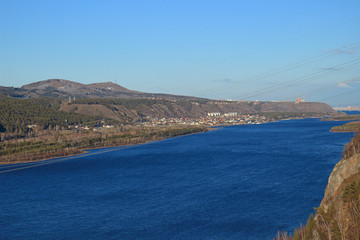 Fototapeta na wymiar View of the Yenisei River and Krasnoyarsk city from the viewpoint deck on Sliznevsky cliff
