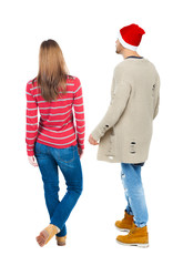 Back view couple in sweater.