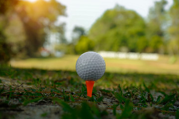 Golf ball on tee ready to be shot