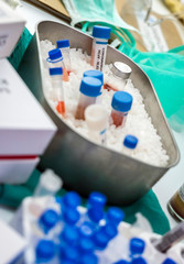 Vials with samples of SARS-COV-2 Covid-19 prepared cold in a hospital, conceptual image