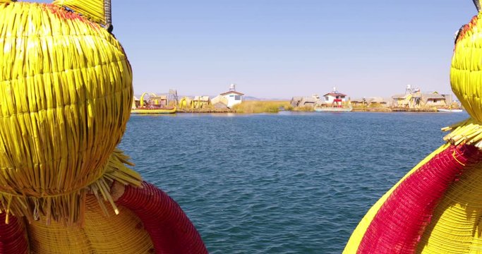 Peru Lake Titicaca typical straw boat in navigation