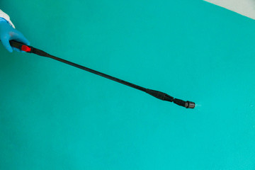 Disinfectant spray in hand