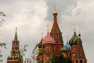 Moscow's kremlin. View of the Spasskaya tower and St. Basil's Cathedral. The City Of Moscow, Russia