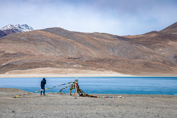 View landscape of Himalayas mountains and Frozen lake Pangong Tso high grassland lake while winter...