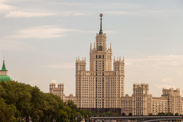 Fototapeta na wymiar View of the embankment of the Moscow river and the hotel Ukraine in Moscow. View from the observation bridge of Zaryadye Park