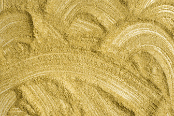 Detailed texture of glittering golden dust surface. Golden Shiny Wallpaper , Perfect for Christmas, New Year or any other Holidays Background. Golden fine powder