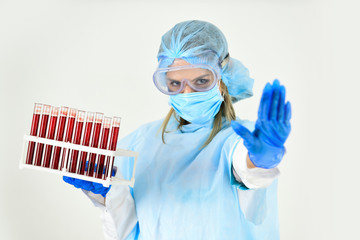 stop coronavirus. coronavirus pandemic outbreak. woman doctor hold testing tubes in lab. nurse work...