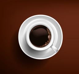 Classic white cup of coffee americano on a chocolate background. View from above
