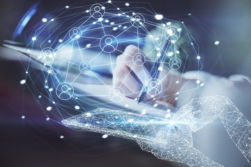Social network theme hologram over woman's hands writing background. Concept of international people connect. Double exposure