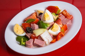 Mix salad jam, eggs and vegetables