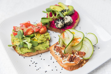 Vegan and gluten free toast, with colorful ingredients.