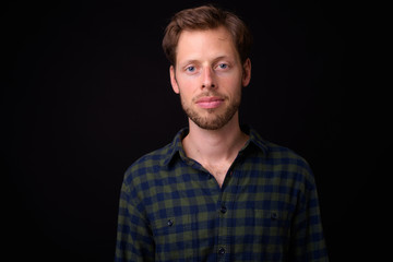 Fototapeta premium Face of bearded hipster man looking at camera