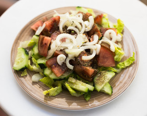 vegetarian healthy vegetable salad on brown plate