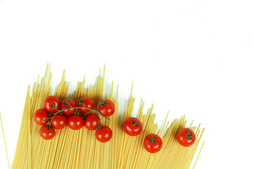 
close-up of spaghetti and cherry tomatoes on a white background