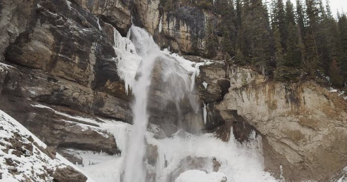 Panther Falls Flowing On The Nigel Creek In The Canadian Rockies, British Columbia, Canada During Winter.-medium shot