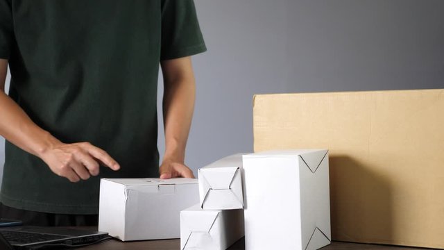  prepare object to delivery for online maket , work from home concept.