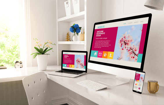 home office setup with responsive design on screen