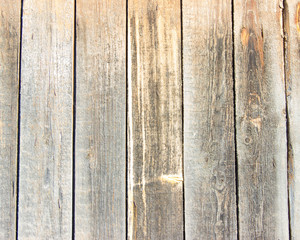 Naklejka premium Faded planks arranged vertically, texture of old boards