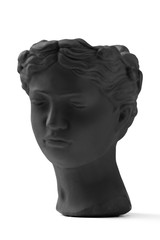 Subject shot of a black ceramic flower pot made as an antique head. The garden-pot is isolated on the white background. 